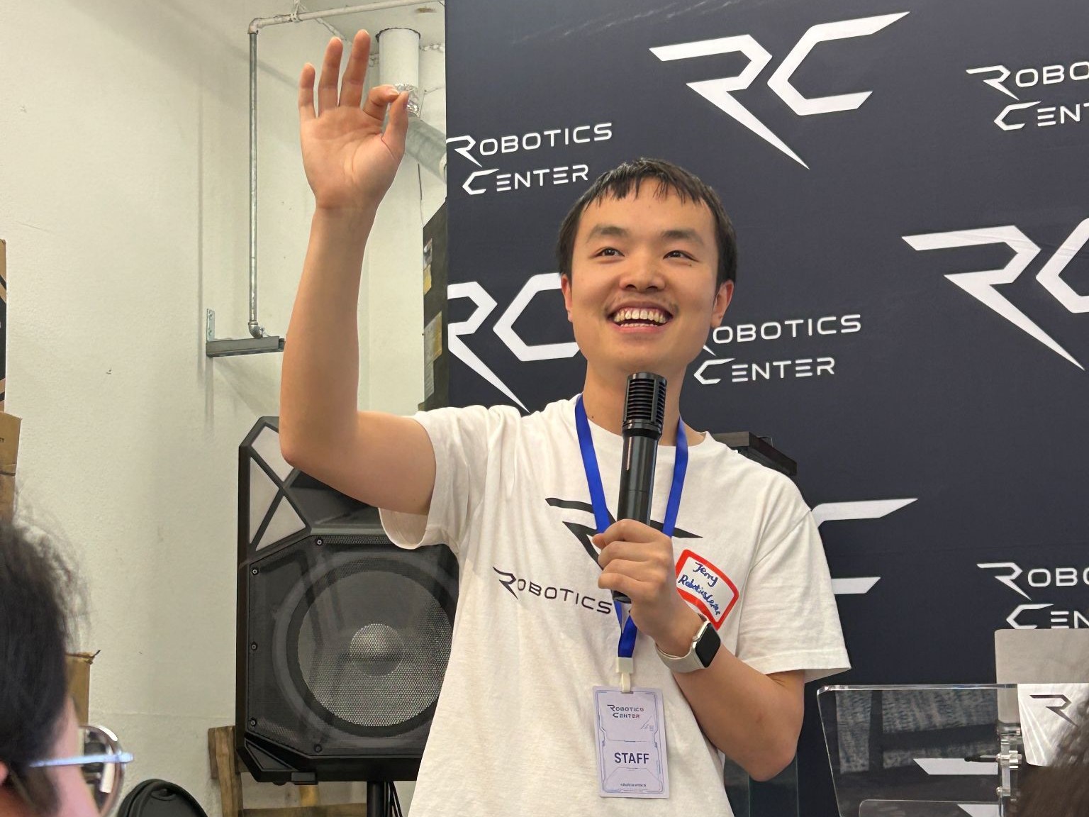 Jerry Huang addressing the room