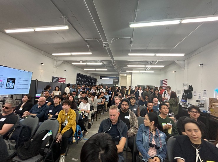 A packed audience at the Robotics Center